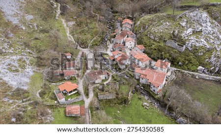 High-angle view of Bulnes, a hidden small mountain village and the last in Asturias without road access, accessible only by foot or funicular. Asturias, Spain.