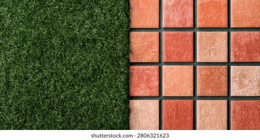 A high-angle view of a contrasting surface split down the middle. On the left is a lush, green artificial turf, and on the right is a neat arrangement of square terracotta tiles.