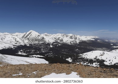 High-angle winter view looking up the snow-covered ridgeline of the Tenmile Range with Quandary Peak, Colorado, USA