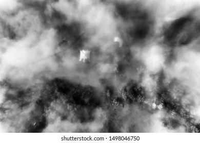 High-contrast Black-wite Top Down View Of Remote Farm In Kangaroo Valley Of Australia Covered By Thick White Fog.