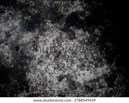 High-contrast macro shot of an aged, decayed cement wall with heavy stains and a strong vignette effect. The chaotic organic textures and selective lighting give the image a mysterious deep space lookalike feel, seamlessly blending industrial grit with a cosmic galaxy texture.