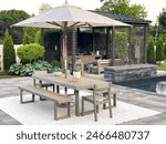 High-end outdoor living space, a backyard patio with pergola, outdoor rug,  tequila bar, dining set, couch, television, pool with waterfall, umbrella, fire pit and stunning grey patio. Modern boho.