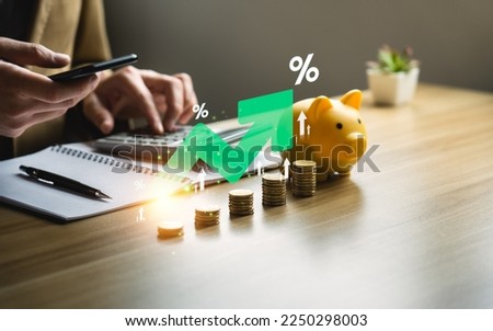 higher interest rates and dividends, pile of coins and percentage of company profits. saving money for Invest in growth and pay out dividends, cash reserves.compensation fund for retirement