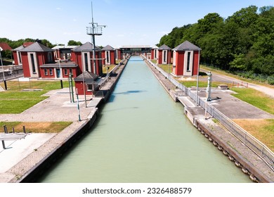 Higher surface level water basin at Hindenburgschleuse mittellandkanal canal, ready to take next boats to lower surface level. Anderten, Hannover, Germany - Shutterstock ID 2326488579