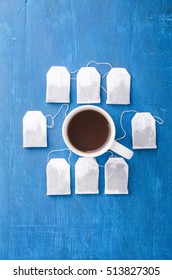 Highest class tea bag and cup. Background.