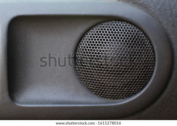 high-frequency car\
speaker in the car door. The concept of good and high-quality music\
in the car, copy space,\
modern
