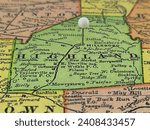 Highland County, Ohio marked by a white tack on a colorful vintage map. The county seat is located in the city of Hillsboro, OH.