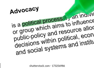 Highlighted Words  Political Process For Advocacy With Green Pen Over White Paper. Isolated White Background.