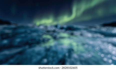 A highly blurred abstract background featuring ethereal green aurora borealis light patterns glowing over a soft, out of focus dark blue landscape with shimmering bokeh highlights.