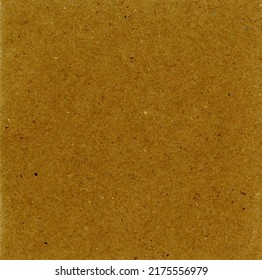 Highly Detailed Magnified Close Up Cardboard Carton Recycled Paper Texture Background Fine Grain Caramel Brown Smooth With Large Dust Particles Uncoated Fiberboard Wallpaper With Copy Space For Text 