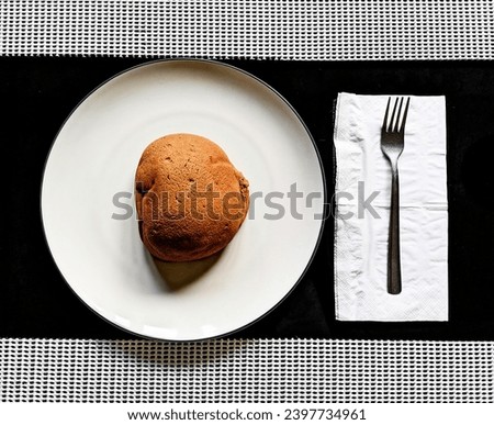 Highly Simplistic Meal - Bread with fork beside it