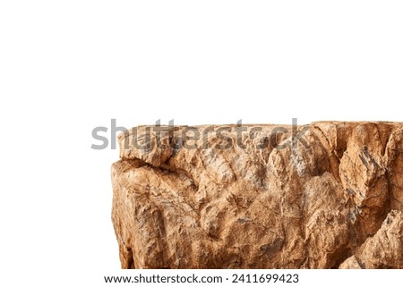 A highly textured brown rocky cliff isolated on white background