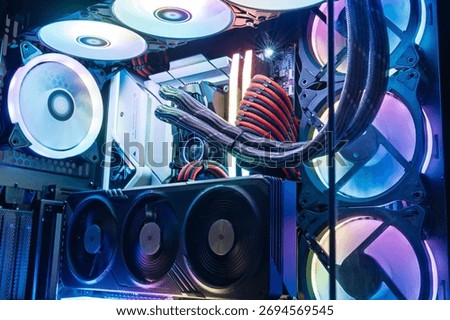 A high-performance computer system with RGB lighting and liquid cooling. Ideal for gaming and video editing, it combines peak performance with stunning visuals for tech enthusiasts.