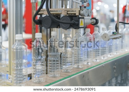 high-precision automated bottling system at work to efficiently fill and cap bottles in a streamlined process