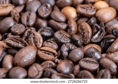 Highquality coffee bean shot emphasizing vibrant gloss, Exquisite shot of luxury coffee beans emphasizing lustrous coloration suitable for upscale branding and marketing campaigns