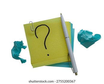 High-quality conceptual image featuring a black hand-drawn question mark on a stack of yellow and blue sticky notes. A white ballpoint pen lies next to the notes, accompanied by two pieces of blue crumpled paper, symbolizing failed attempts or discarded ideas. Perfect for business presentations, educational materials, FAQ sections, and articles about problem-solving, psychological support, creative crises, and strategic planning. The composition is minimalist and clear