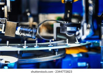High-quality control in manufacturing optical sorting machine for fasteners screw in product line	 - Shutterstock ID 2344772823