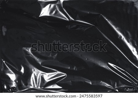High-quality image featuring a plastic cellophane texture. Its unique crinkly and translucent character adds a tactile dimension to designs. Ideal for crafting a modern transparent aesthetic