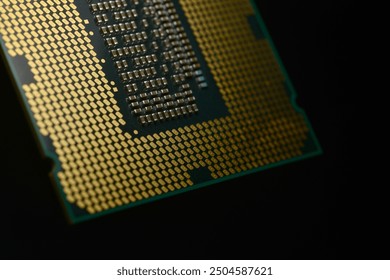 High-quality microprocessor featuring a dense grid of gold-plated contacts for optimal connectivity and performance. This component is crucial for high-speed data processing, making it an essential