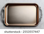 High-quality rectangular metal tray with handles isolated on white background for elegant culinary presentations- food photography- and professional kitchen design projects