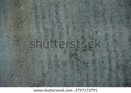 High-resolution abstract gray concrete texture featuring a weathered cement surface with subtle stains, rough grain, and natural imperfections. Industrial background with neutral tones, ideal for design projects, architecture concepts, construction themes, overlays, wallpapers, and textured backdrops.