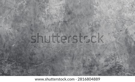High-resolution background texture of a dark gray stone surface with fine cracks and natural marble veins. Raw weathered concrete wall pattern, perfect for architectural designs, 3D rendering, dark mode wallpapers, and grunge background projects.