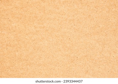 A high-resolution close-up of an innovative composite material made from sawmill waste, compressed sawdust, and recycled paper fibers. This textured surface represents the future of sustainable furniture design and eco-friendly construction. The spotted, organic pattern of the wood chips and fiber fragments creates a unique aesthetic, perfect for backgrounds related to recycling, upcycling, and environmental protection. This particleboard or MDF-style panel is an excellent example of the circular economy, where wood waste is reused to create durable building materials. Ideal for architectural presentations, sustainable product catalogs, and interior design blogs focusing on natural textures and bio-based materials. The neutral beige tone and rough, pressed structure make it a versatile backdrop for text overlays in green energy and ecology projects. Whether you are illustrating a DIY carpentry guide or a report on industrial waste management, this authentic recycled timber texture delivers a powerful message of sustainability