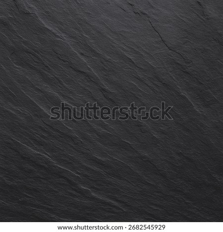 High-resolution close-up of slate stone surface with dark gray layered structure, natural lines, and subtle cracks. Realistic rock texture perfect for architecture, design, and backgrounds.
