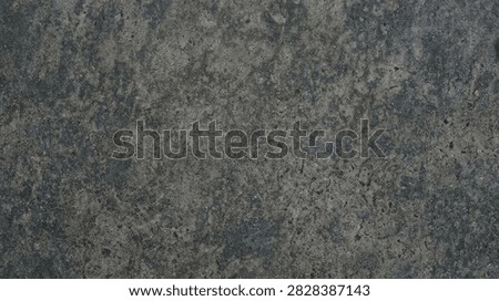 A high-resolution dark gray concrete surface with a weathered, textured finish and natural stone aggregate. This neutral industrial background provides a solid, gritty foundation suitable for graphic design projects, product photography, or website backdrops.