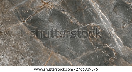 High-resolution gray marble texture featuring elegant natural patterns and subtle golden veining. This luxurious stone surface combines earthy tones with organic cracks and mineral details, making it ideal for backgrounds, interior design, branding, packaging, and digital artworks. Perfect for use in architectural visualization, product mockups, and premium design projects.