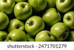 high-resolution image of a bunch of fresh, green apples closely packed together. The apples are glossy and vibrant, with smooth and slightly dimpled skins.