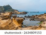 High-resolution image capturing the stunning coastal scenery and world-famous rock formations of Yehliu Geopark in northern Taiwan