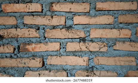High-resolution image of a rustic red brick wall.
Red brick wall arrangement in Indonesia