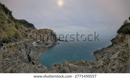 High-resolution panoramic view of Cinque Terre capturing dramatic coastline, pastel-colored homes, and lush terraces descending into the Ligurian Sea, perfect for travel, summer, and European landscape visuals