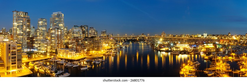 High-resolution stitched image of downtown Vancouver, Granville Bridge and Granville island at dusk. Shot from Burrard's bridge.