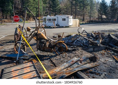 A High-rider Motorcycle And Home Were Totally Destroyed By The Beachie Creek Wildfire In Detroit Oregon, Sheriff Command Post Vehicle In Background