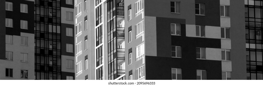 High-rise buildings background, black and white photo of facades - Powered by Shutterstock