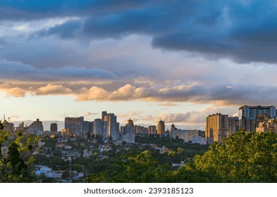 High-rise buildings are covered with clouds.City landscape with cloudy sky.City of Kyiv Ukraine - Powered by Shutterstock