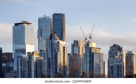 Highrise Residential and Commercial Buildings in Modern Downtown City. Vancouver, British Columbia, Canada. Winter Sunset. - Shutterstock ID 2269945809