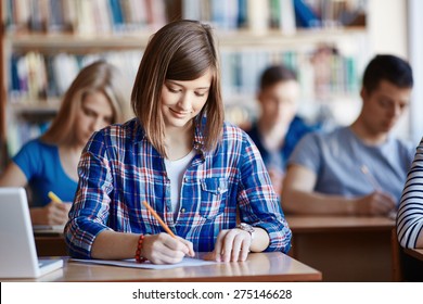 Highschool Student Carrying Out Task At Workplace