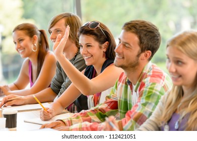 High-school Student Raising Her Hand In Class Lesson Teenagers Study