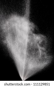 Highspeed Photography of Explosion of Water Filled Spray on black background