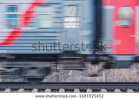 Highspeed train moves fast at day time.