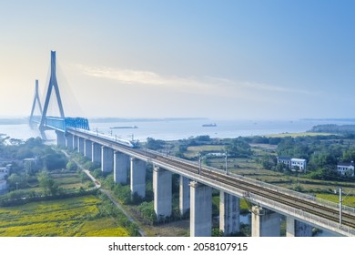 high-speed train passes over the railway bridge, Anqing city, Anhui province, China