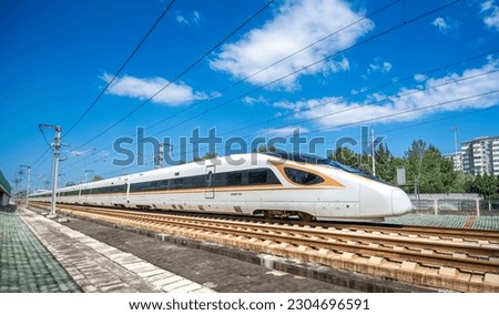 High-speed train running on railway.