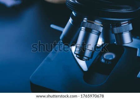 Hight technology microscope at science laboratory for technician using in a histological sample education, a biopsy in the laboratory of research