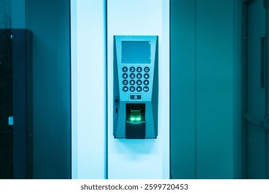 High-tech biometric access control system featuring a fingerprint sensor and keypad for secure entrances. Ideal for offices and facilities prioritizing safety and technology.