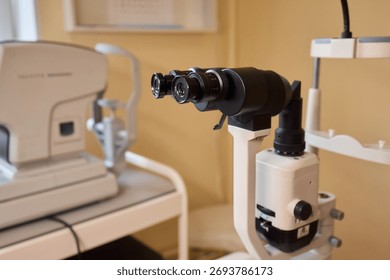A high-tech optical microscope designed for precision scientific analysis in any laboratory setting