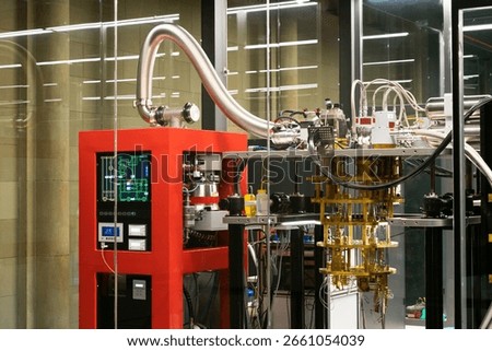High-tech Quantum Computer Setup in Laboratory with Cryogenic Cooling System and Complex Wiring in Glass-Enclosed Room.