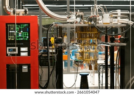 High-tech Quantum Computer Setup in Laboratory with Cryogenic Cooling System and Complex Wiring in Glass-Enclosed Room.